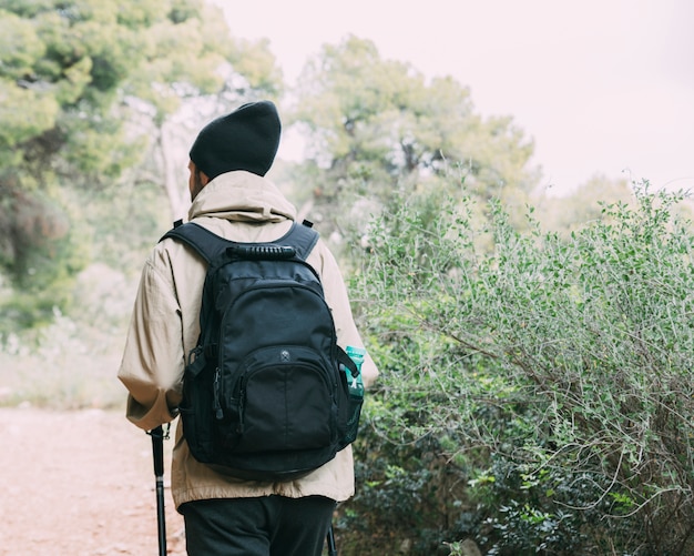 Man Trekking in Mountains: Free Stock Photos for Adventurers