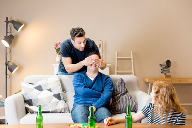 Man trying to surprise friends at home