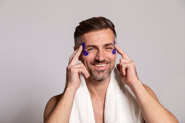 Man using anti aging treatment