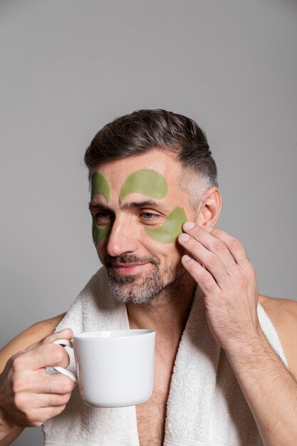 man using anti aging treatment
