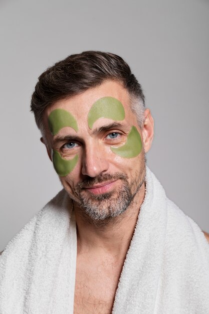 Man using anti aging treatment