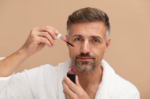 Man using anti aging treatment