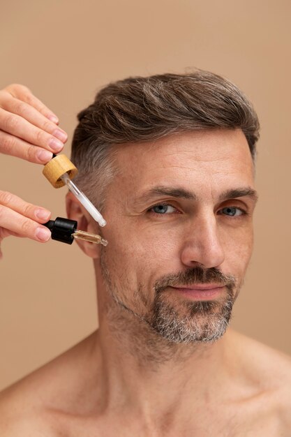 Man using anti aging treatment