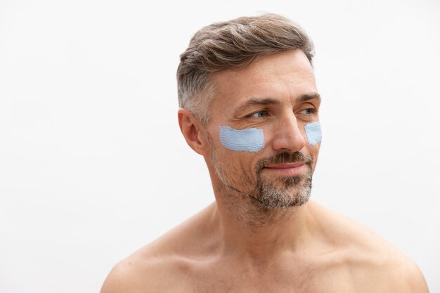 Man using anti aging treatment