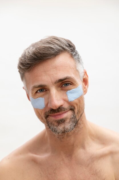 Man using anti aging treatment