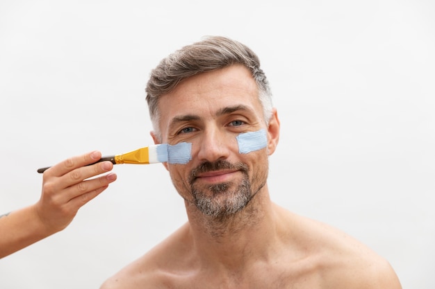 Man using anti aging treatment