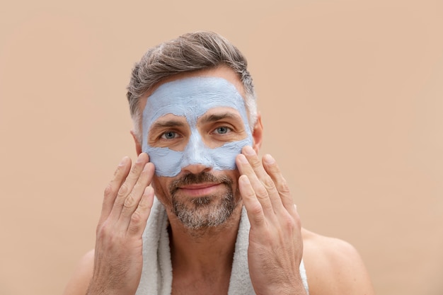 Man using anti aging treatment