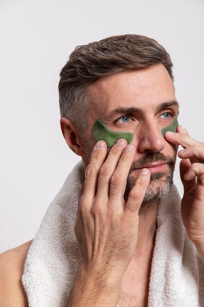 Man using anti aging treatment