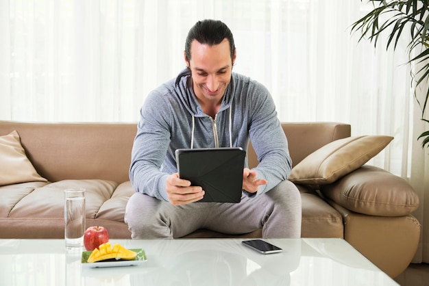 Man using digital tablet