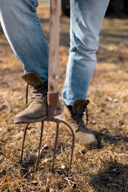 Man using fork rural lifestyle concept