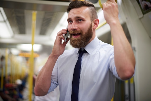 Man using mobile phone in the underground