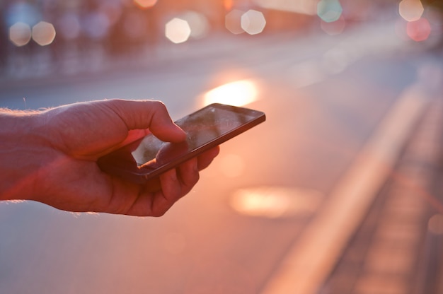 Man using mobile smartphone.