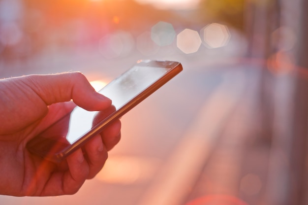 Man using mobile smartphone.