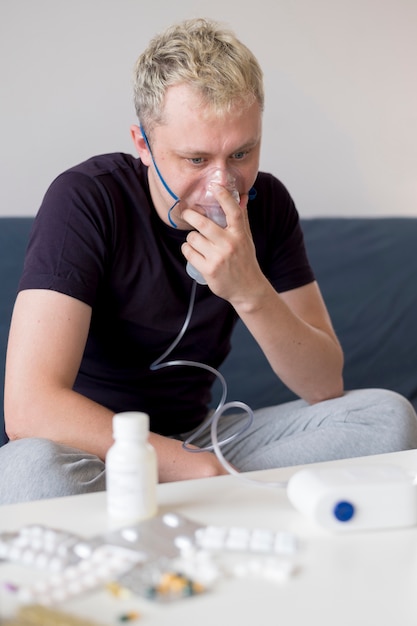 Man using an oxygen mask