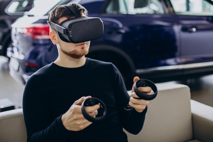 Free Photo man using and playing with vr glasses
