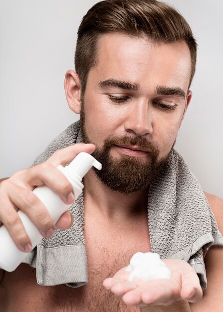 Man using shaving cream