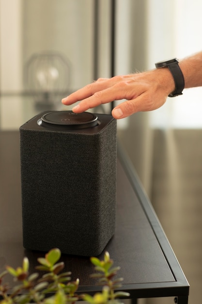 Man using a smart speaker