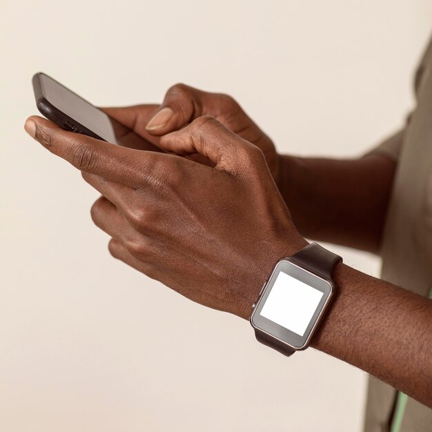 Man using smartphone close-up