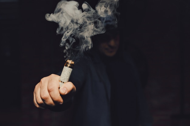 Man vaping an electronic cigarette