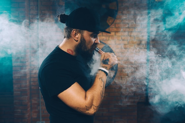 Man vaping an electronic cigarette