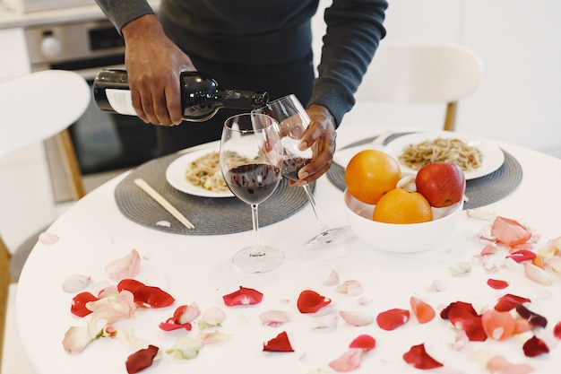 Man waiting for girlfriend on Valentine's Day