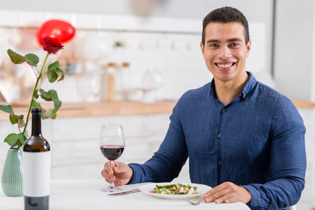 Man waiting to take dinner with his wife