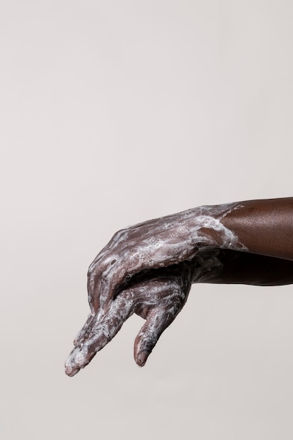 Man washing hands with soap