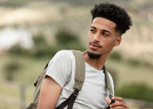 Man wearing backpack medium shot