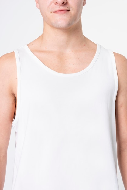 Free photo man wearing basic white tank top sleepwear with design space