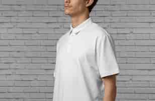 Free photo man wearing blank shirt