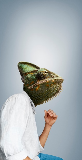 Man wearing chameleon head side view