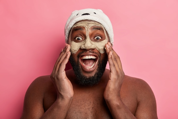 Man wearing cosmetic mask on face for dermatology skincare