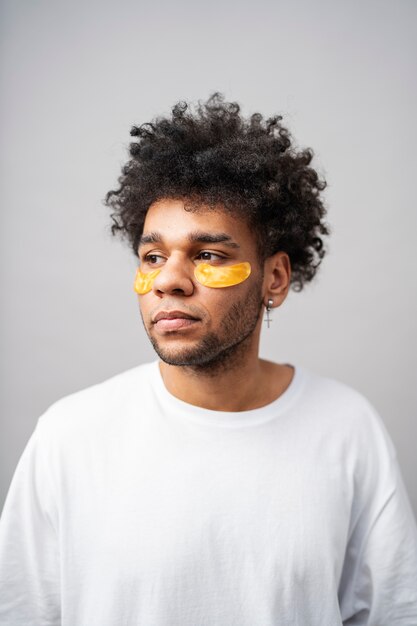 Man wearing eye patches medium shot