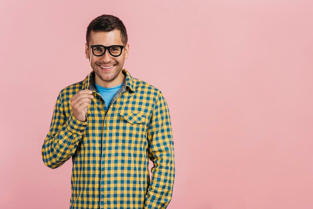 Man wearing fake glasses with copy space