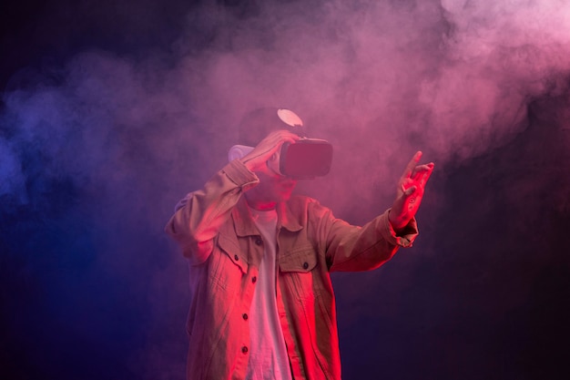 Man wearing futuristic vr goggles with special effects