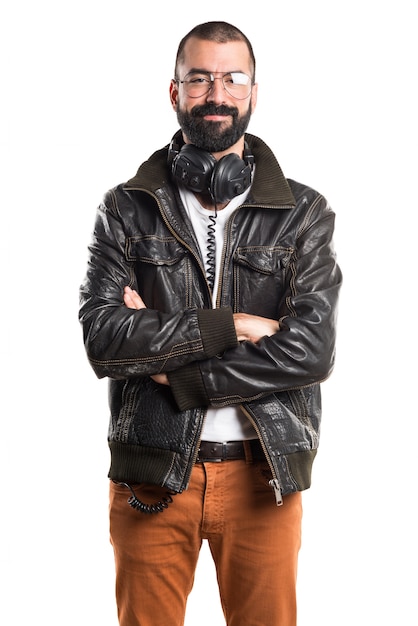 Man wearing a leather jacket listening music