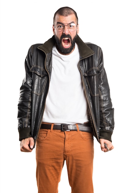 Man wearing a leather jacket shouting