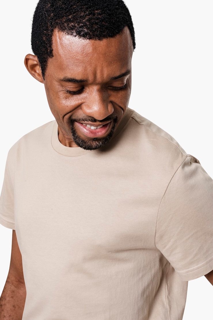 Free Photo man wearing minimal beige t-shirt