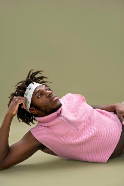 Man wearing pink top medium shot