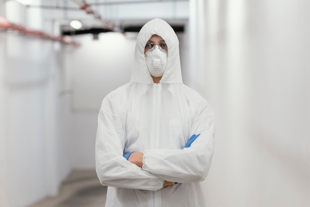 Man wearing a protective equipment against a bio-hazard