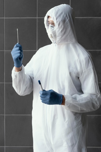 Man wearing a protective equipment against a bio-hazard