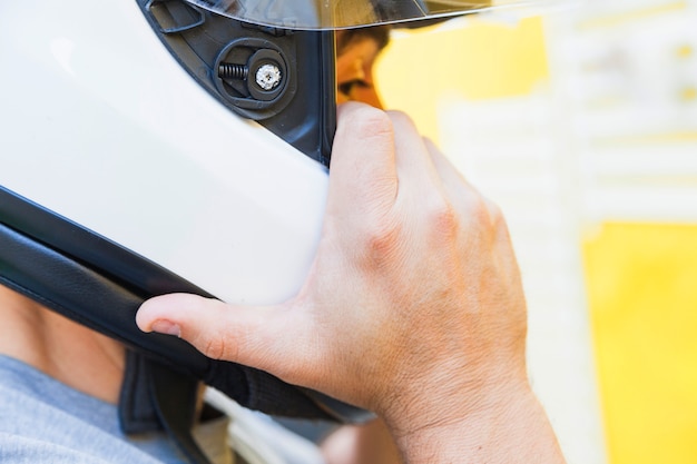 Free photo man wearing protective helmet