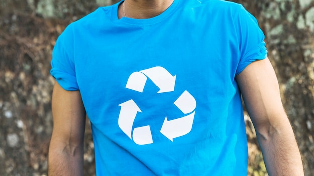 Free photo man wearing recycle t-shirt