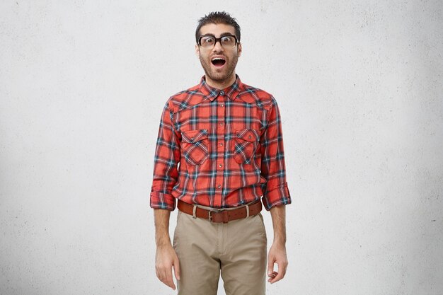 Man wearing striped shirt and eyeglasses