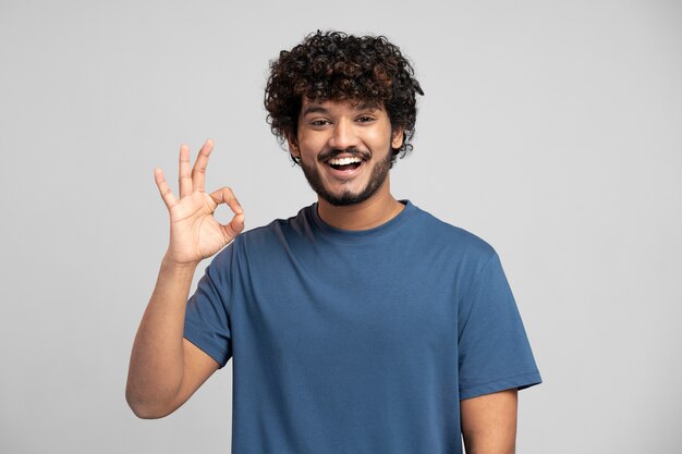 Man wearing t shirt gesturing