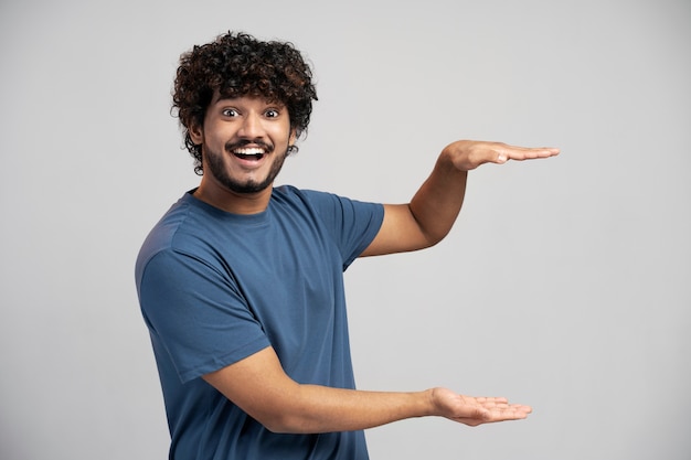 Man wearing t shirt gesturing