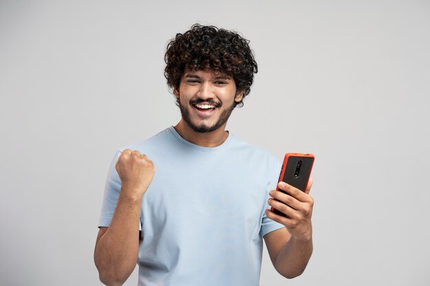 Man wearing t shirt gesturing