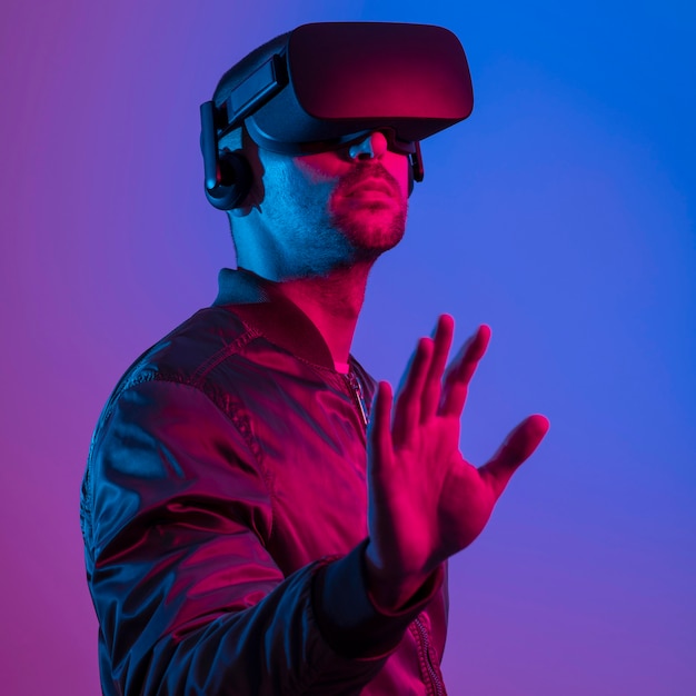 Man wearing vr glasses  with gradient background