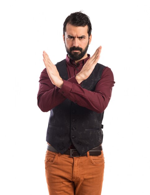 Man wearing waistcoat doing NO gesture