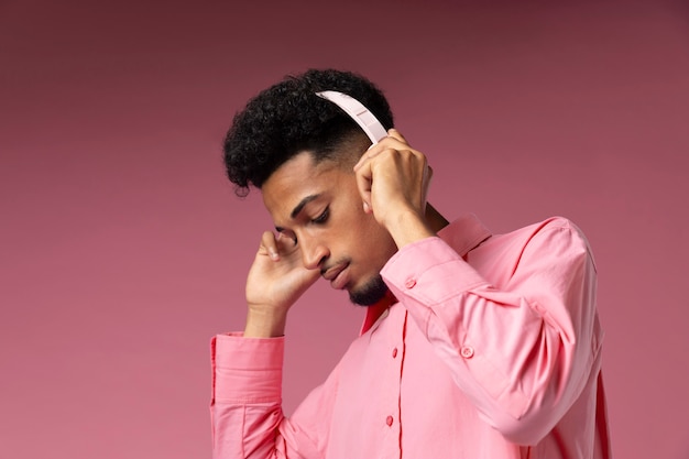 Man wearing white headphones medium shot